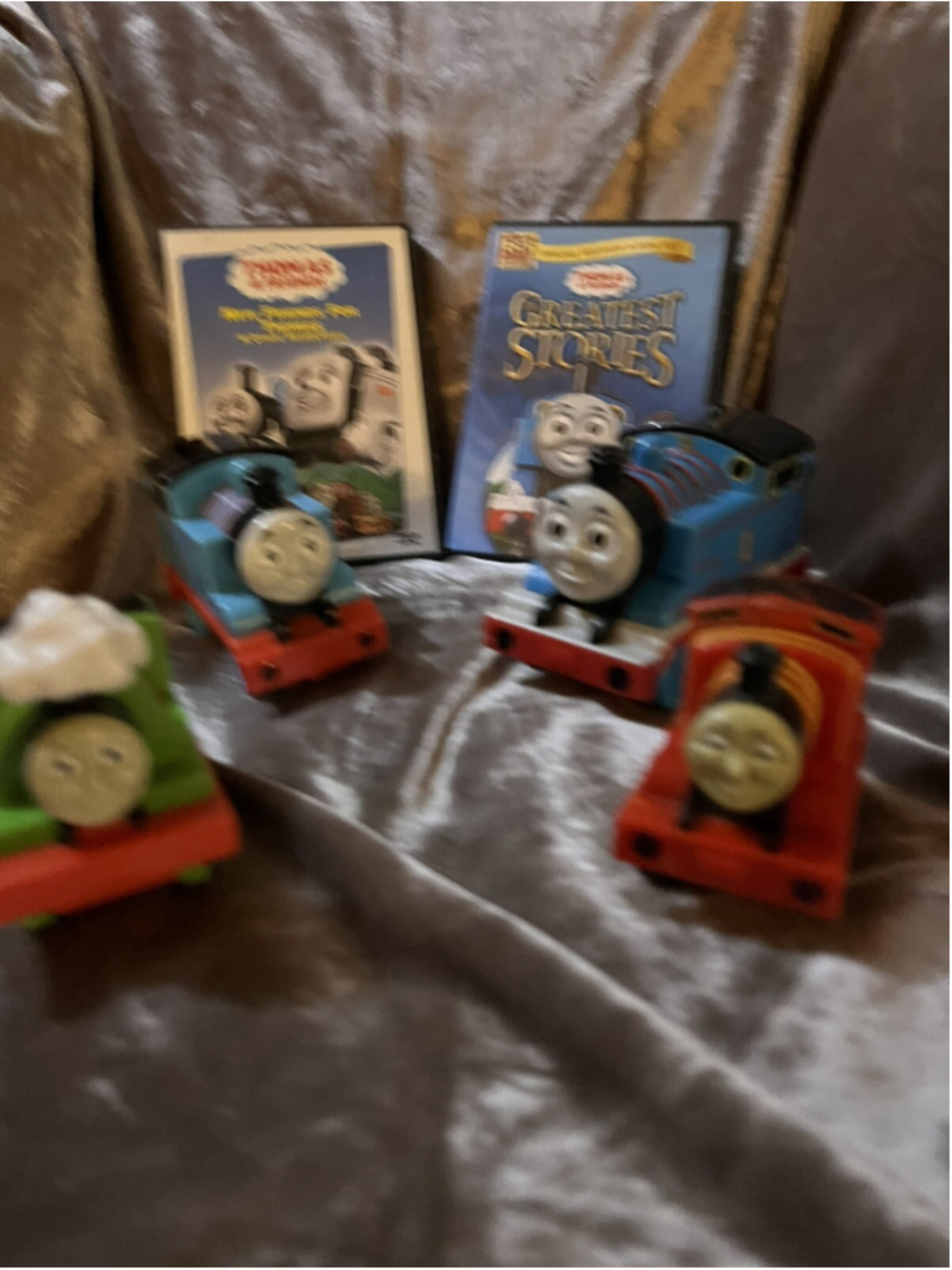 Thomas the Tank Engines, 4 toys , & 2 dvds see all photos nice for lost trains